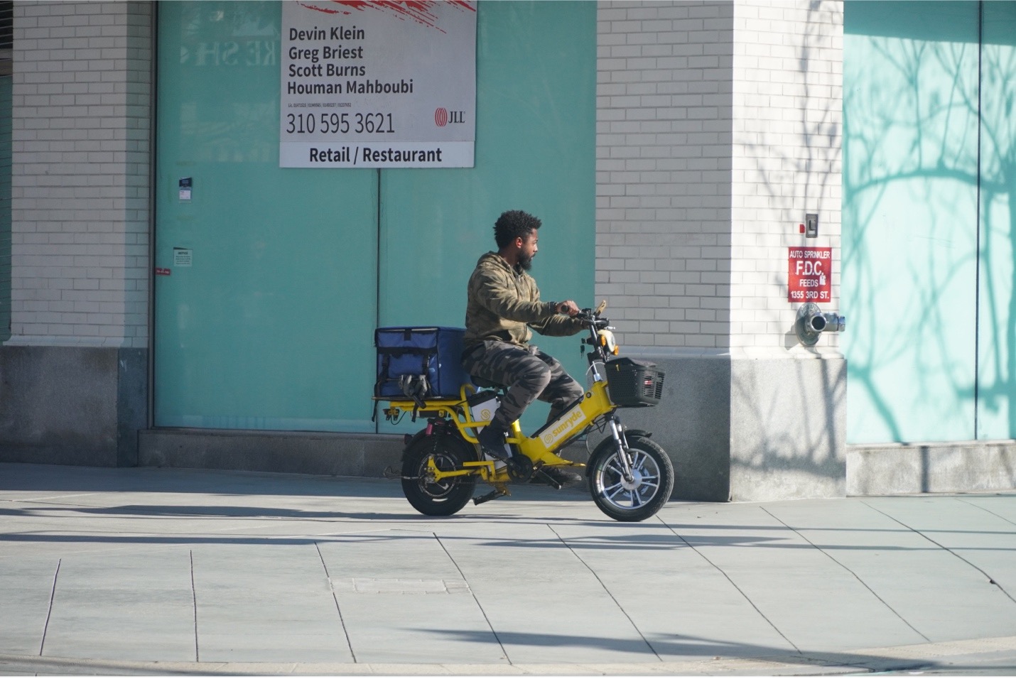 delivery man on scooter