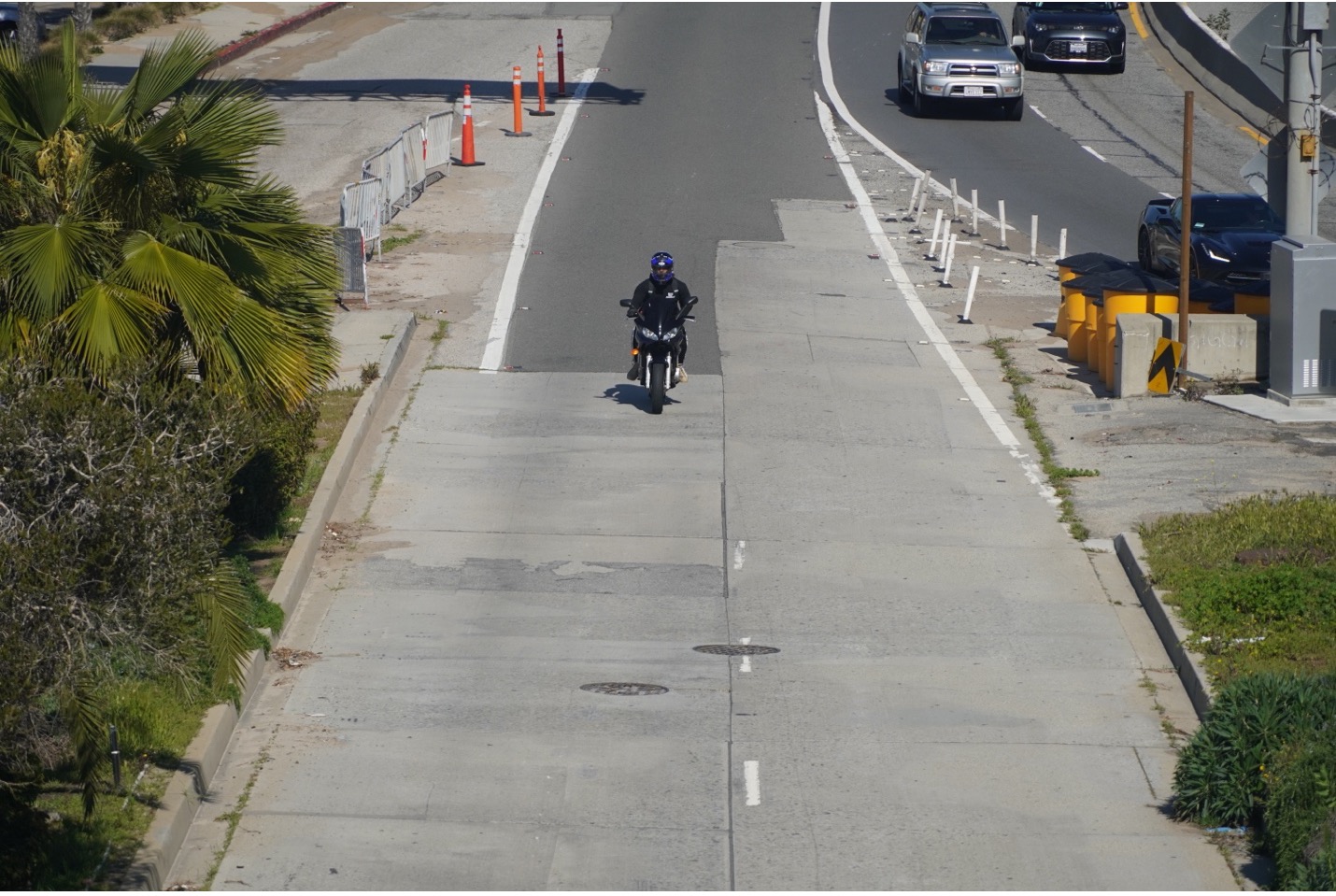 Motorcycle on road exit ramp