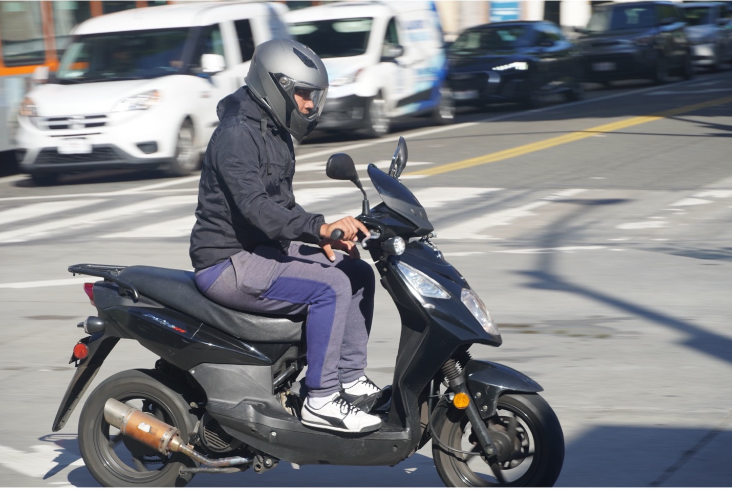 Person riding scooter