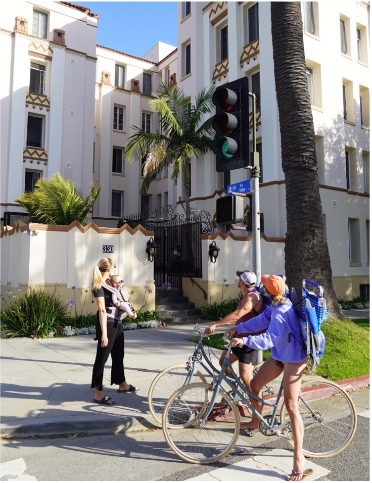 bike riders at stop sign